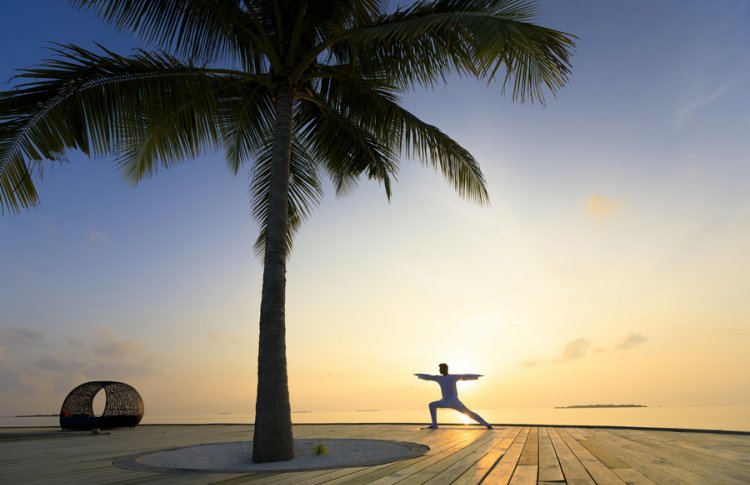 Время йоги в Dhigali Maldives